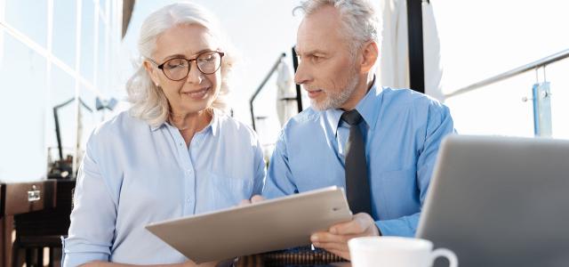 Near-Retirement Business Leaders Collaborating